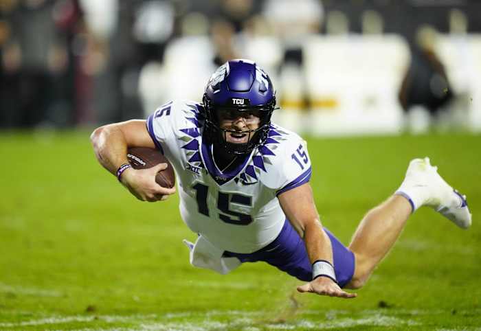 Sep 2, 2022; Boulder, Colorado, USA; TCU Horned Frogs quarterback Max Duggan (15) dives with the ball in the fourth quarter against the Colorado Buffaloes at Folsom Field. Mandatory Credit: Ron Chenoy-USA TODAY Sports